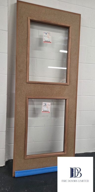Unpainted paint grade MDF FD30 fire door blank with two rectangular fire-rated vision panels