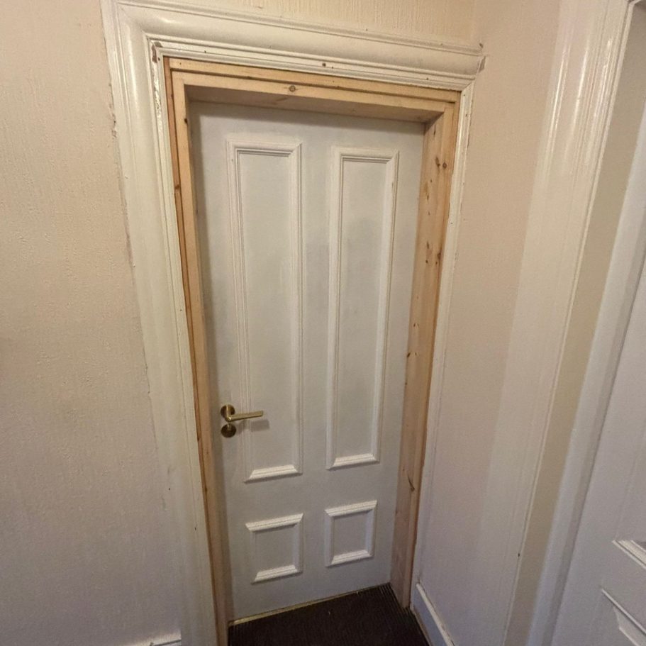 Bespoke 6-panel internal fire door manufactured to match period aesthetics, providing certified FD30 safety for heritage 