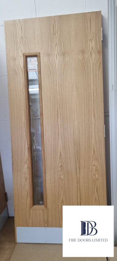 glazed oak veneer fire door long vision panel and kick plate